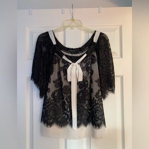 Karen Kane black and cream lace blouse. Size XS. Never worn.